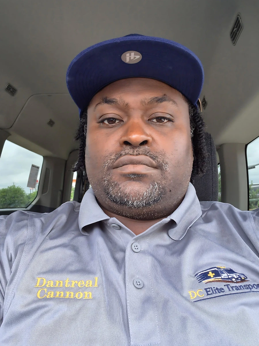 Dantreal Cannon wearing a DC Elite Transport branded shirt
