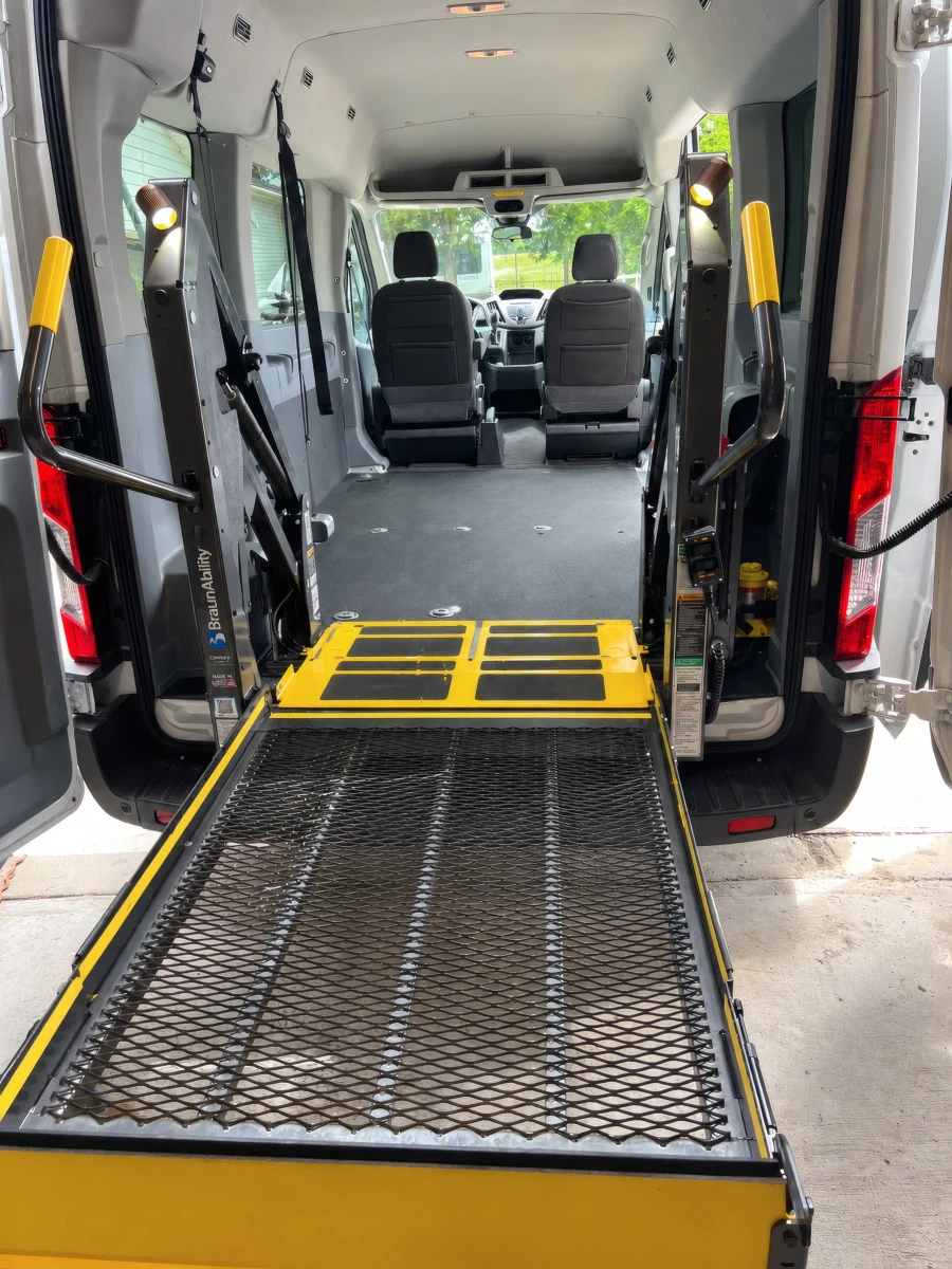 DC Elite Transport wheelchair-accessible van with the rear lift extended